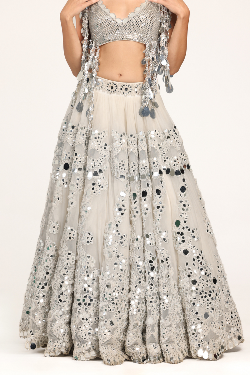 ivory embellishment lehenga with fringes blouse