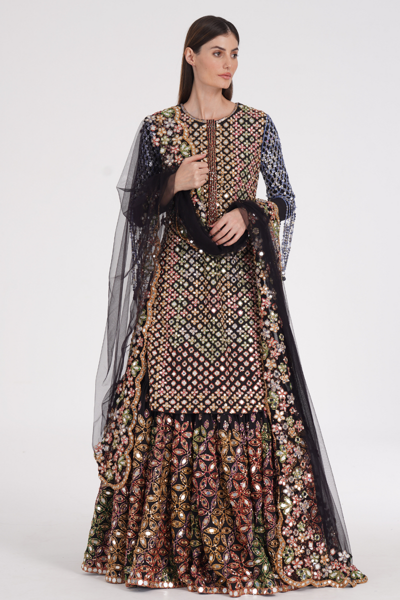 Matte black kurta skirt set embroidered using warm Pastels