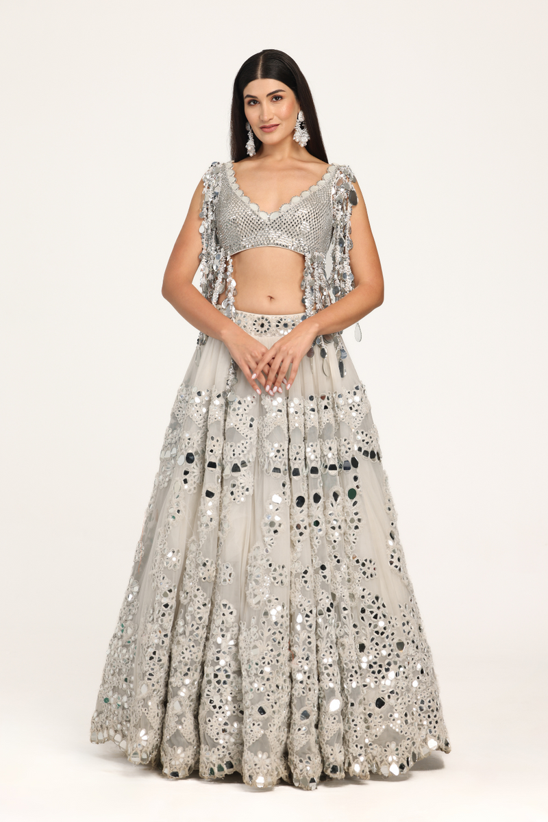 ivory embellishment lehenga with fringes blouse