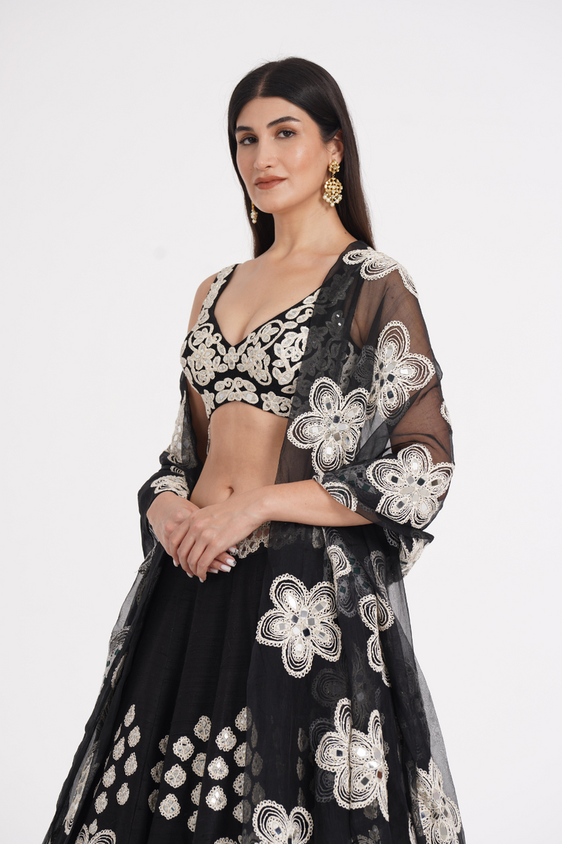 Jet black lehenga set embellished using ivory details