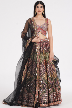 Matte black lehenga embellished using warm pastels