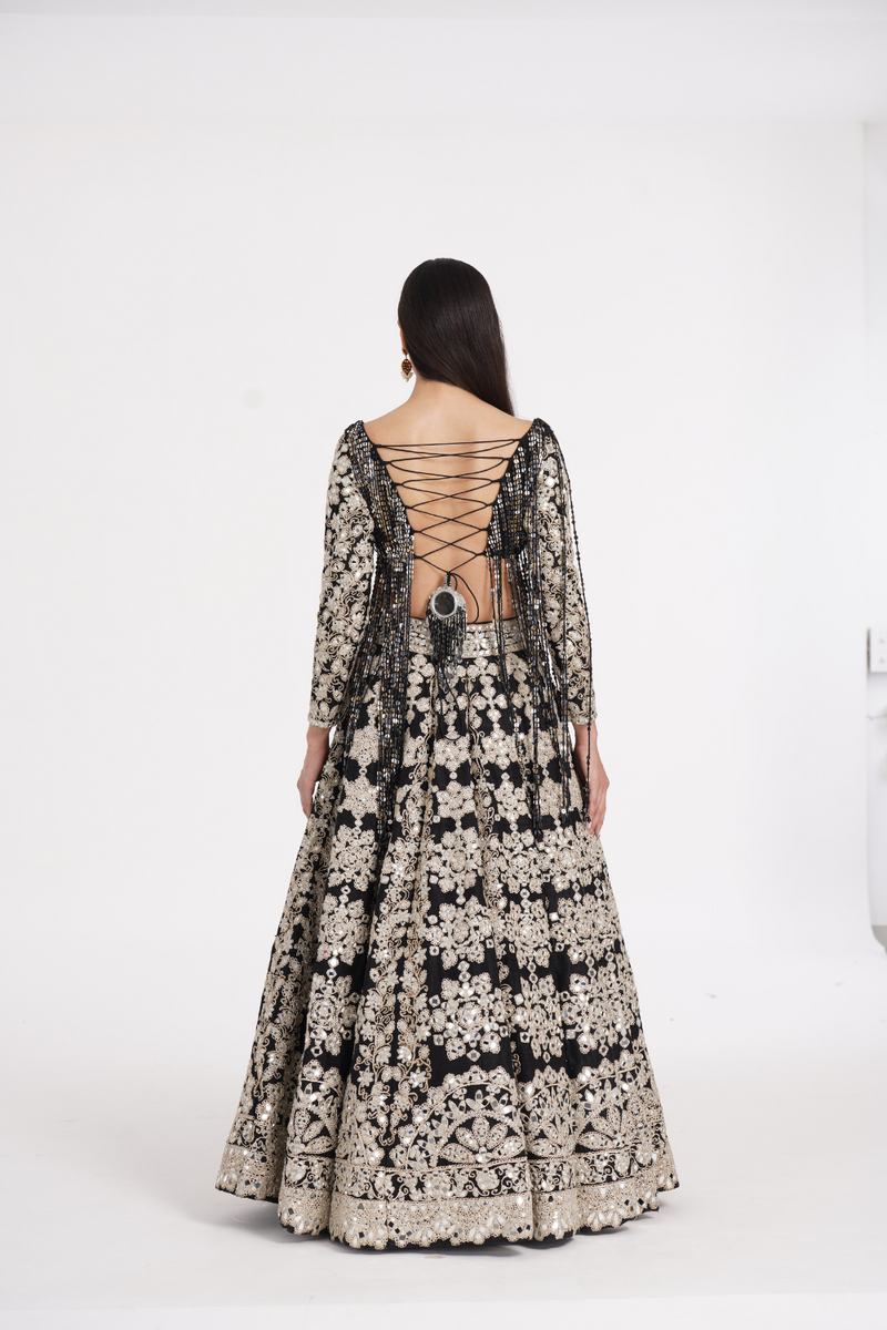 Jet black lehenga set embellished using ivory details