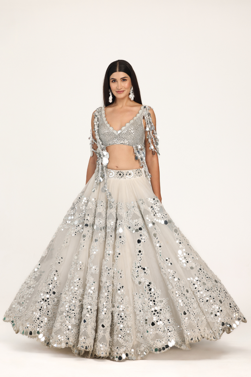 ivory embellishment lehenga with fringes blouse