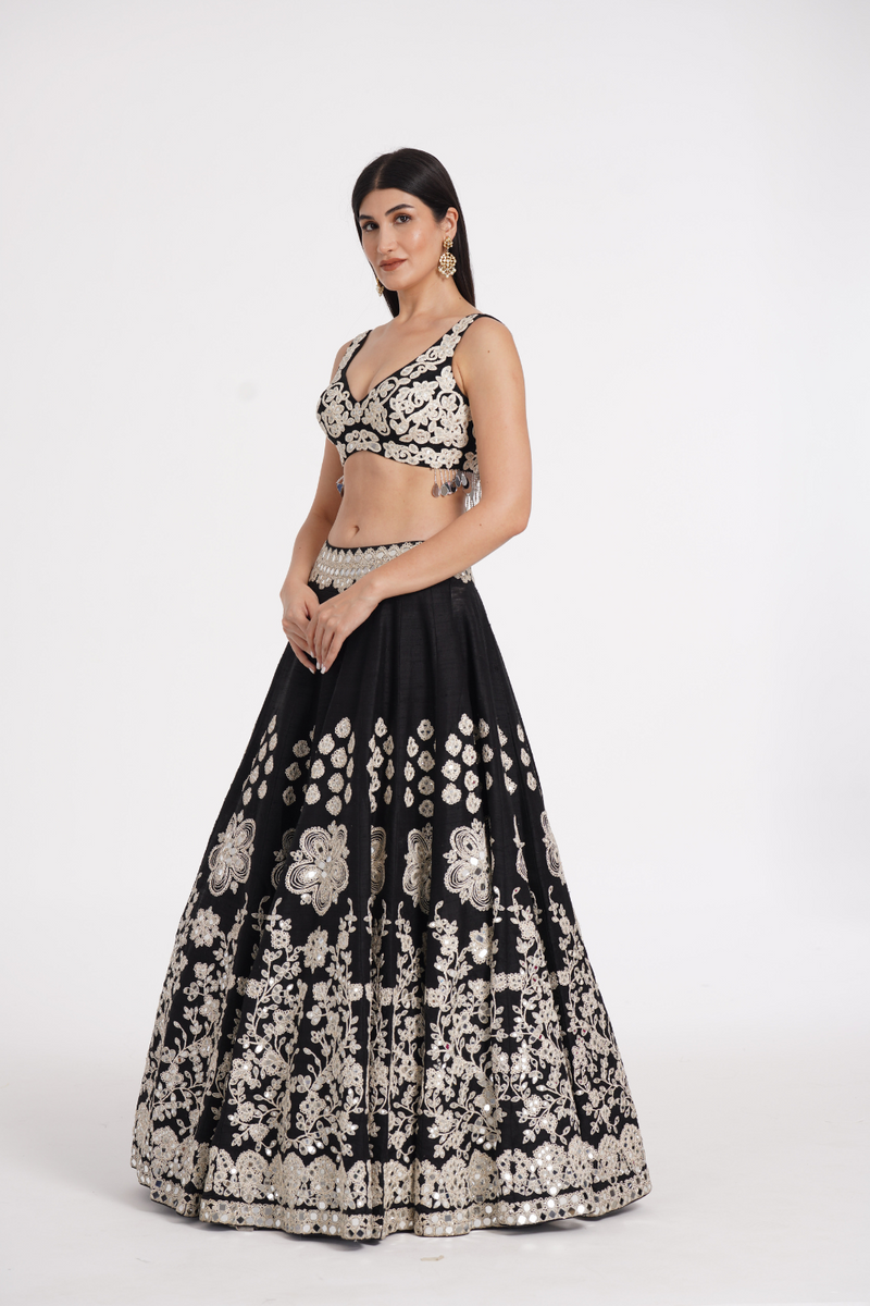 Jet black lehenga set embellished using ivory details