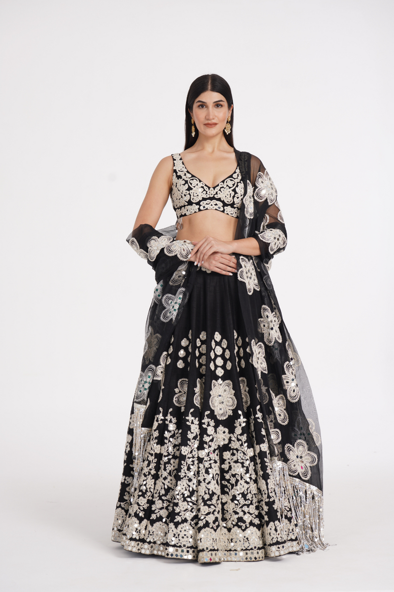 Jet black lehenga set embellished using ivory details